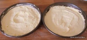 Batter for a sponge cake divided between two pans