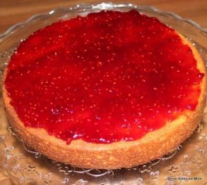 raspberry jam spread on a sponge sandwich