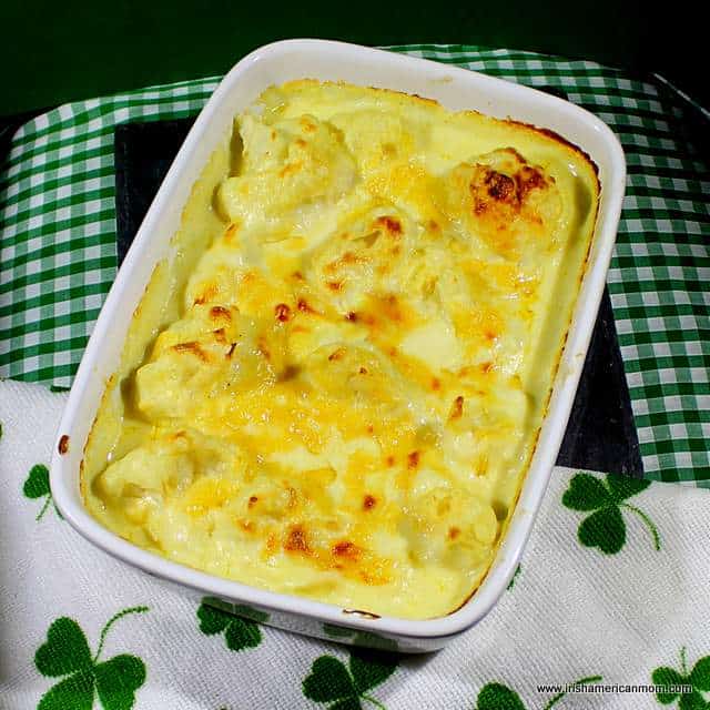 cauliflower-cooked-in-cheese-sauce | Irish American Mom A white casserole of baked cauliflower cheese