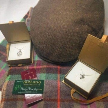 Tweed hat, plaid scarf and pendants in boxes