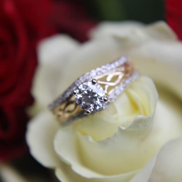 Celtic knot engagement ring with gold band and diamond