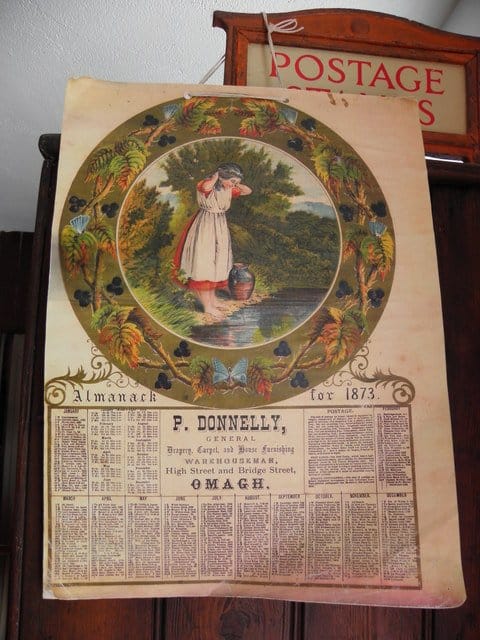 Almanack and calendar from Omagh, County Tyrone dated 1873 | Irish American Mom Vintage calendar with the image of a girl by a lake