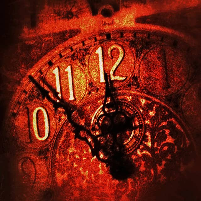 Clock approaching midnight | Irish American Mom A close up of a clock