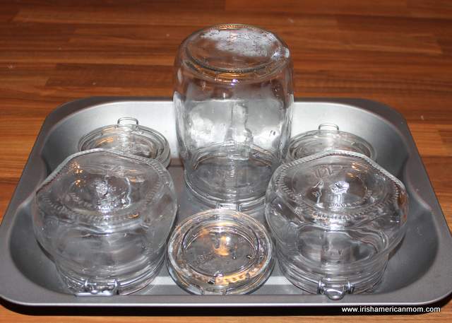 Preserve jars on a baking pan for sterilizing in the oven | Irish American Mom Serilizing jars in the oven by placing them on a metal baking pan