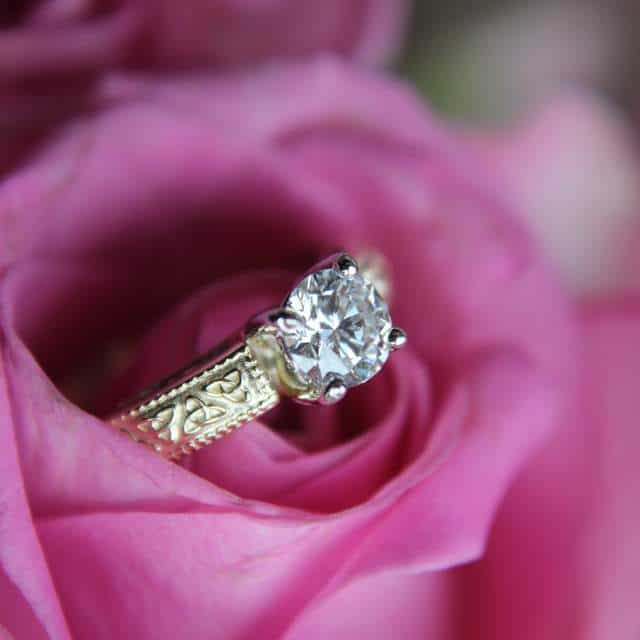Diamond wedding ring with Celtic Trinity knots on the gold band