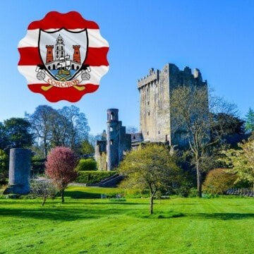 Medieval stone castle with a superimposed coat of arms