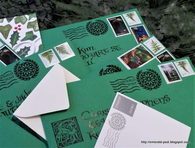 Green envelopes with stamps