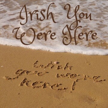 Writing in the sand beside the shoreline