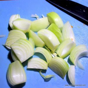 onions cut on a chopping board 