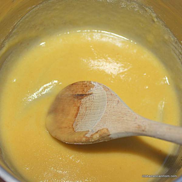 Cooking a roux for parsley sauce | Irish American Mom Stirring milk into a roux to make a white sauce