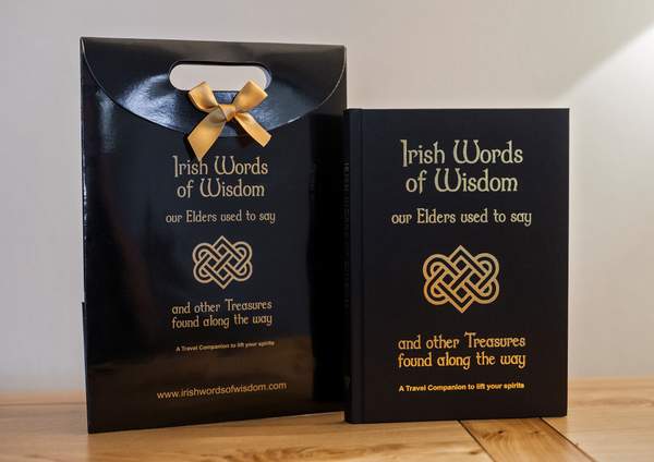 Irish Words of Wisdom by Kate Hamilton | Irish American Mom Text and Celtic knot symbols on a book and a carrier bag