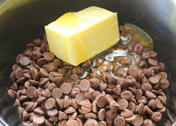 Melting chocolate butter and golden syrup in a bain marie for chocolate Easter nests | Irish American Mom Butter, syrup and chocolate chips