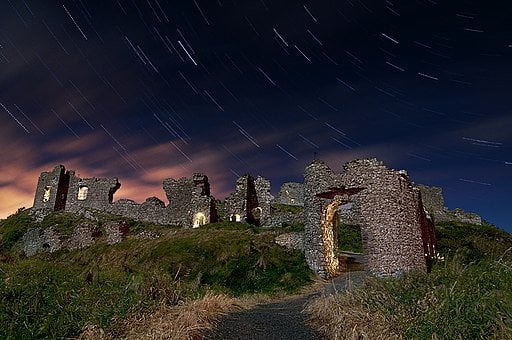 Dunamase Castle at night | Irish American Mom A ruined castle on a hill at night