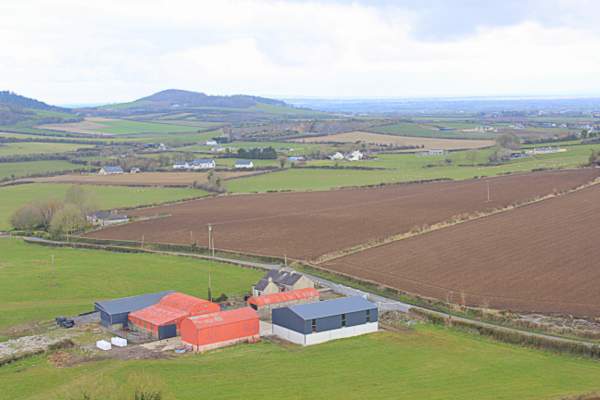 Farmland around the rock of dunamase | Irish American Mom View from the Rock of Dunamase in County Laois showing farmland and the fertile fields of this midland part of Ireland.