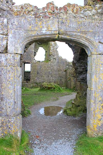 Medieval doorway at the Rock of Dunamase | Irish American Mom A stone building with an arched portal
