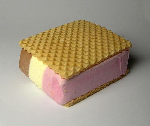 Neapolitan ice cream sandwich | Irish American Mom Neapolitan ice cream slice between vanilla wafers for an ice cream sandwich
