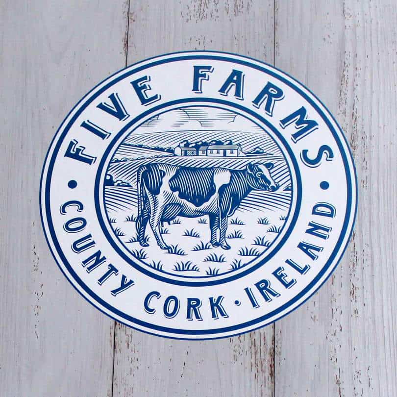 Five Farms is a brand of Irish Cream Liqueur made in County Cork | Irish American Mom A sign featuring a cow
