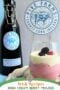 Bottle of Irish cream with a glass of berry mousse