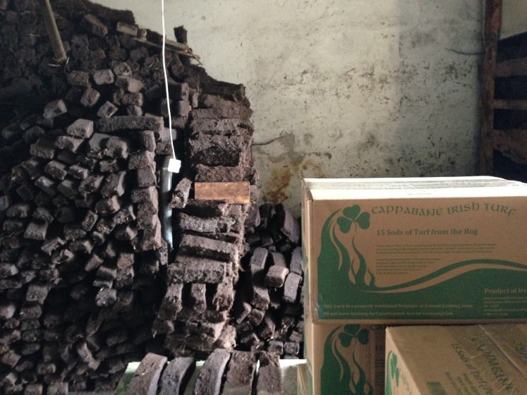Peat or turf stacked in a store room
