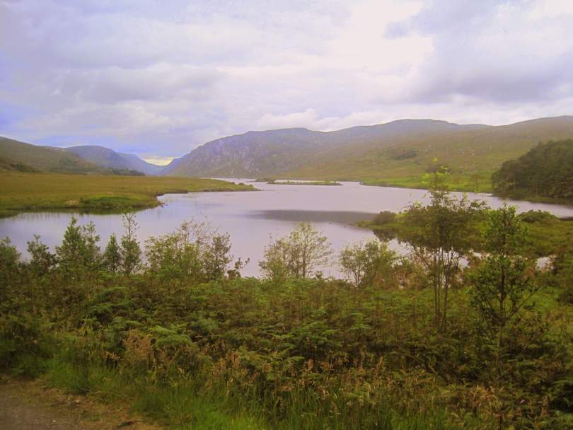 The Lake on the way to Glenveagh Castle County Donegal | Irish American Mom A lake with a mountain in the background