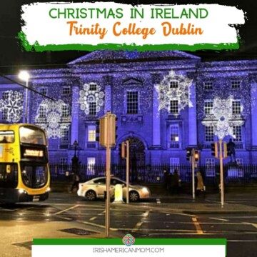 Christmas lights on a building with text banner