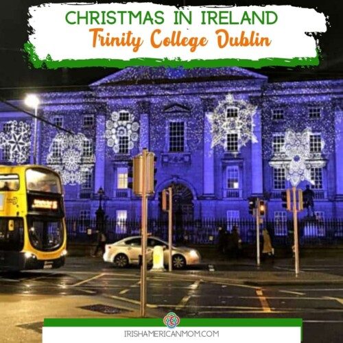 Christmas lights on a building with text banner