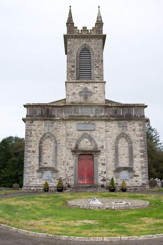 A stone church with a belfry