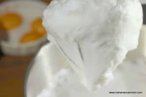 Whipped egg whites on a beater