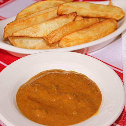 Chips and homemade curry sauce