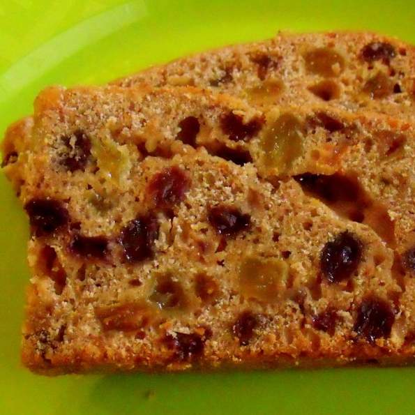 Slice of Irish tea brack showing raisins and currants up close