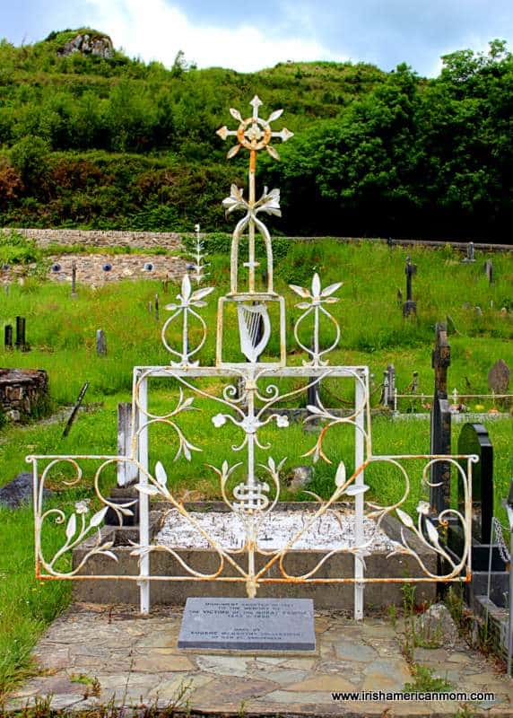 Iron memorial art work with harp in Skibbereen graveyard