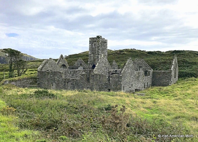 Ruins of an old franciscan abbey or monastery on Sherkin Island County Cork | Irish American Mom A ruined stone building on top of a grass covered field