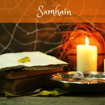 Candle, book and cobwebs with text overlay