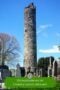Round stone tower with text banner
