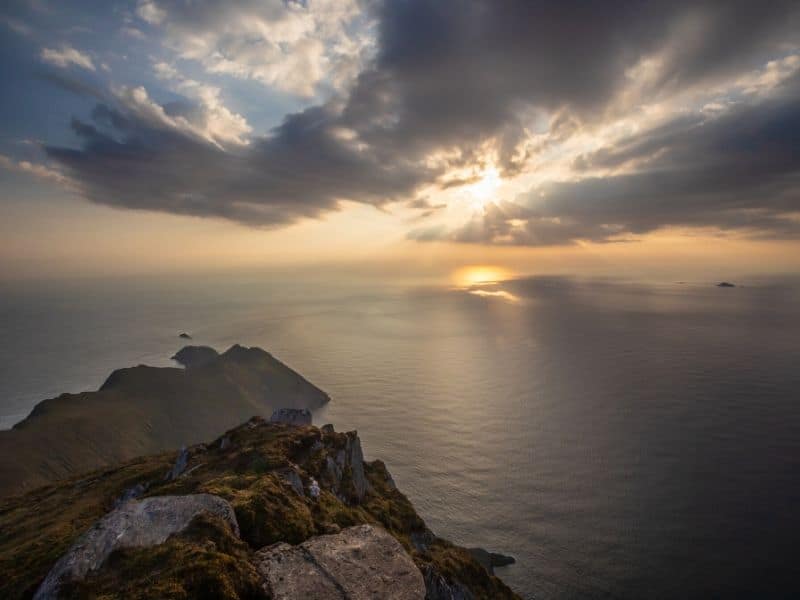 Sun setting over sea cliffs on the Atlantic Ocean