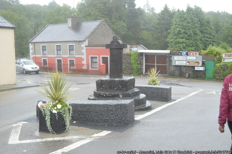 Stone cross in a village