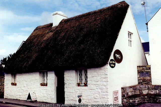 A thatched cottage with white walls in Cong County Mayo is home to the Quiet man museum
