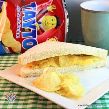 Sandwich with potato chips and a mug