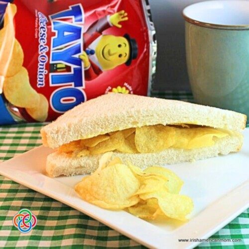 Sandwich with potato chips and a mug