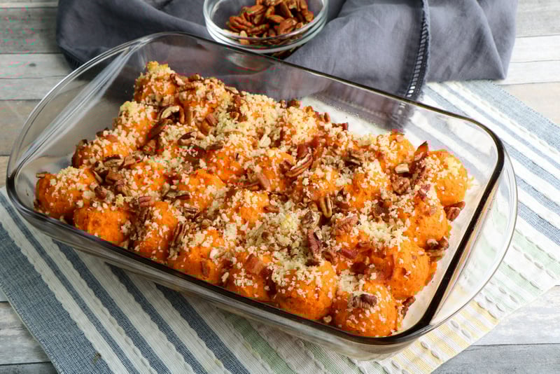 Twice Baked Sweet Potato Casserole with Bacon in a transparent serving dish | Irish American Mom Sweet potato casserole in a transparent casserole dish