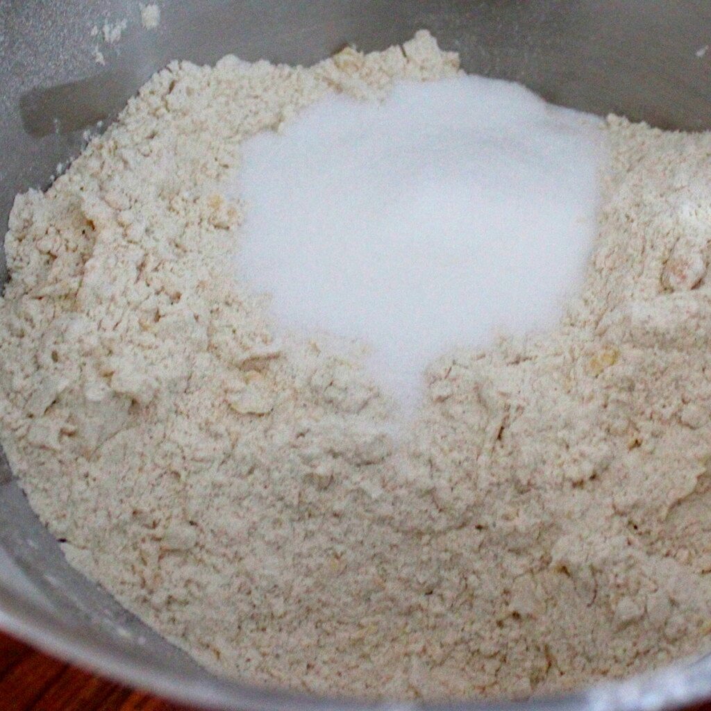 Sugar with flour mixed with butter in a bowl for barmbrack