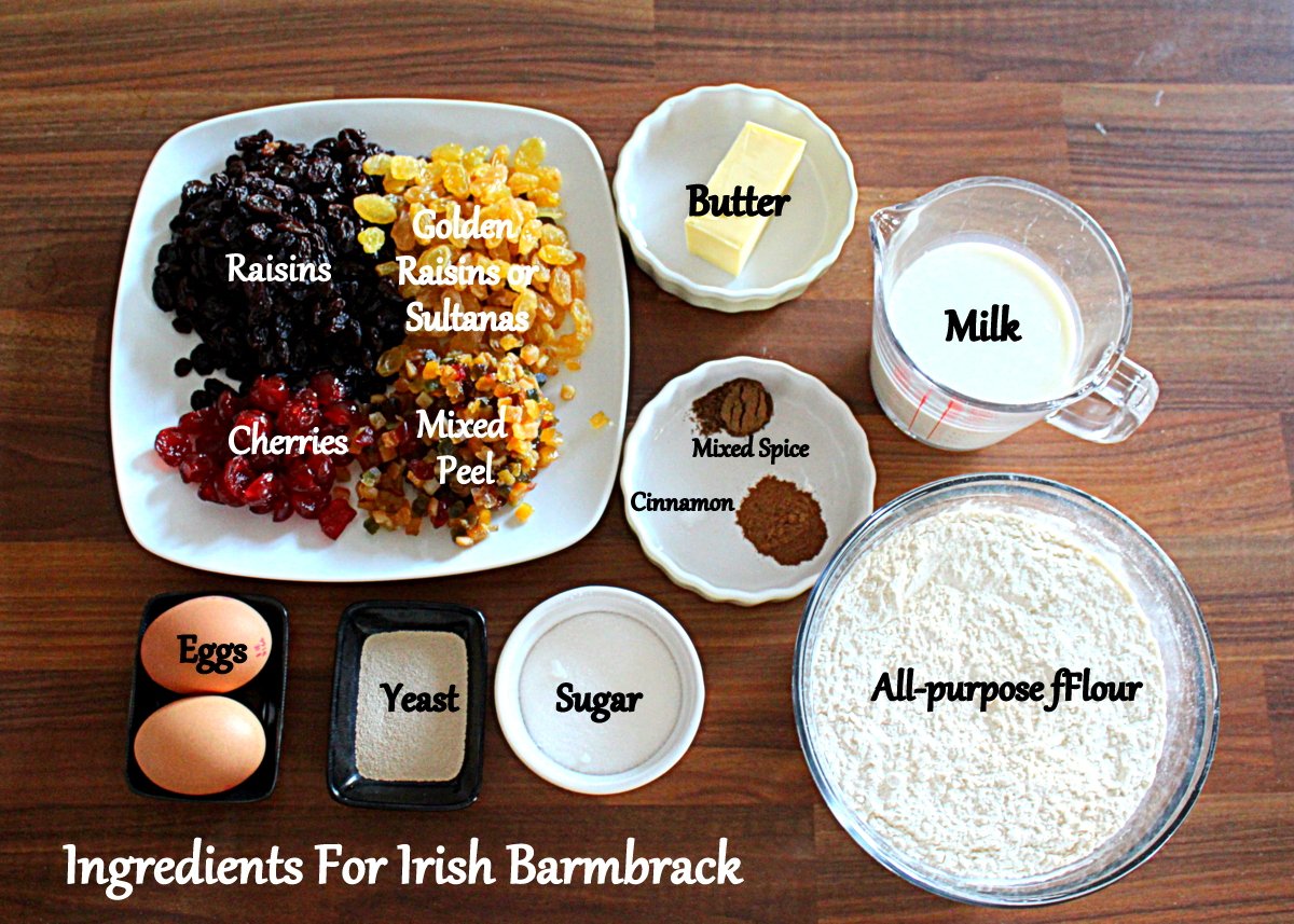 Dried fruit, butter, spices, milk, flour, sugar, yeast and eggs for making Irish Barmbrack