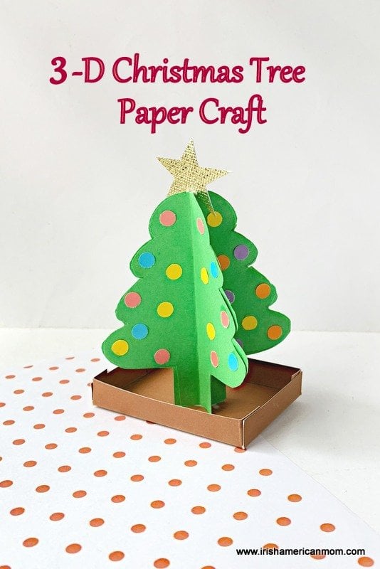 | Irish American Mom A paper Christmas tree in three dimensions on a polka dot surface