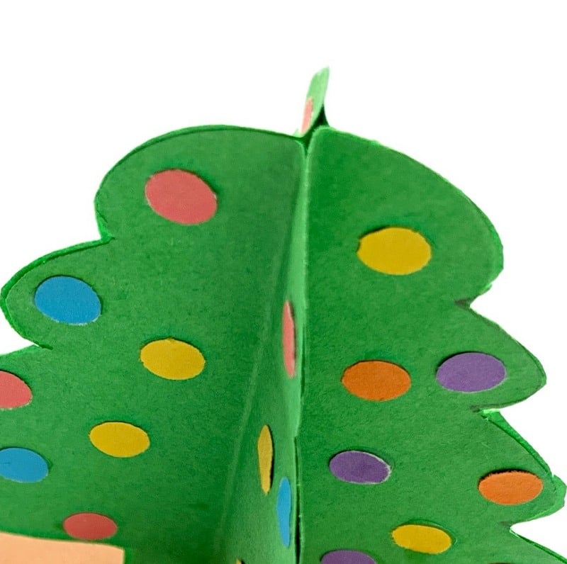 Paper Christmas Tree made of four trees glued together | Irish American Mom Looking down on a paper Christmas tree made from 4 paper trees glued together to form one tree