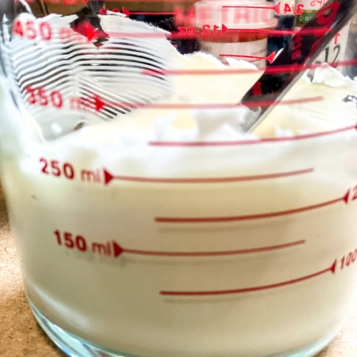 Melted white chocolate in a glass pitcher | Irish American Mom Melting white chocolate in a glass pitcher