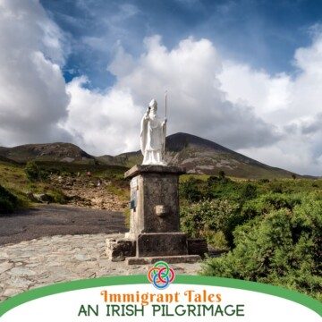 Statue by a mountain with text banner