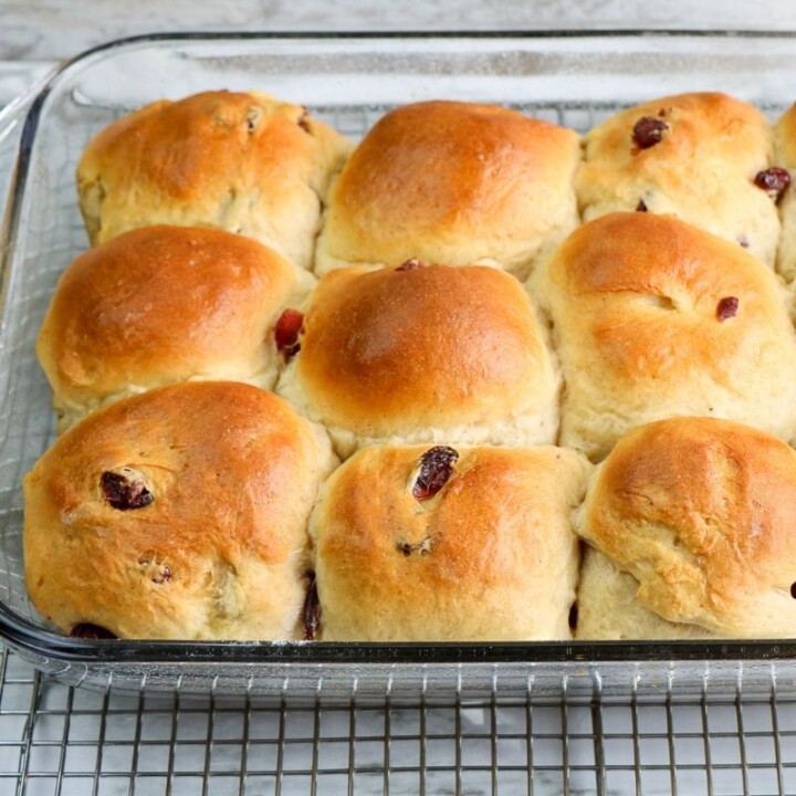 Golden topped baked yeast buns in a casserole