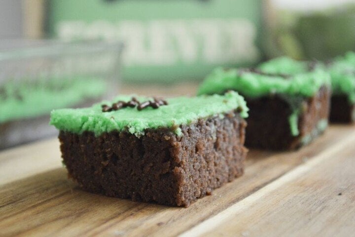 Irish Brownies with green frosting for Saint Patrick's Day | Irish American Mom Brownie squares with green frosting and chocolate sprinkles