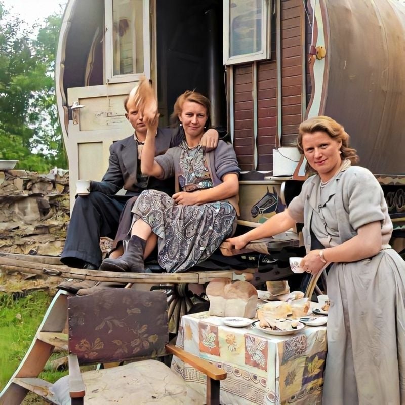 Serving tea and bread beside a caravan