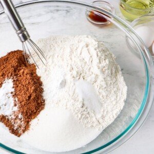 Flour sugar and cocoa powder in a glass bowl